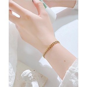 Elegant 18k gold leaf-shaped wheat chain bracelet for women in polished stainless steel