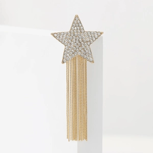 Elegant gold star tassel earrings with rhinestones on a minimalist white backdrop