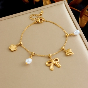 Bracelet À Charme En Acier Inoxydable Plaqué Or Pour Femmes Éléphant Coeur Noeud Étoile De Mer Charms Künstliche Perle Imitation Bijoux