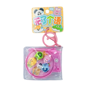 Rotating fishing game keychain with cartoon animal fish and pink swivel in PVC bag