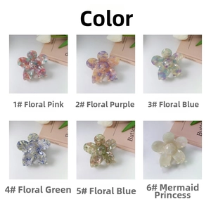 Close-up showing a collection of six colorful acetate flower hair claws in a grid display