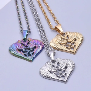 Wolf heart pendant necklaces in gold, silver and rainbow stainless steel finishes