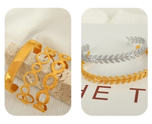 Detail showing stacked vintage gold cuff bracelets and hollow Cuban link chain jewelry