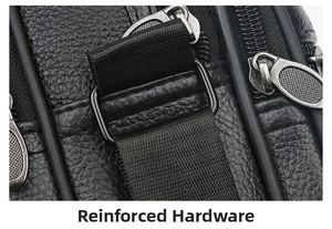 Detail of gunmetal hardware reinforcement and pebble grain leather on crossbody bag