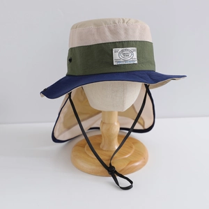 Detail of outdoor sun hat with breathable mesh panels and protective neck flap
