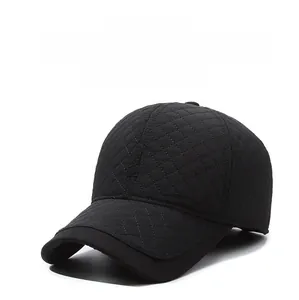 Detail of winter baseball cap with quilted ear flaps and embroidered SPORT logo