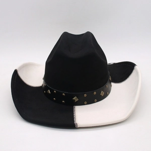 Vintage western cowboy hat in black and white patchwork suede with bronze rivets