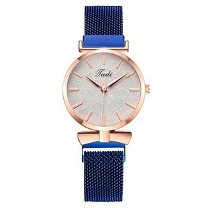 Women's quartz watch featuring a rose gold case and blue magnetic Milanese strap
