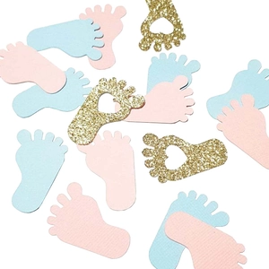 Blue, pink, and gold glitter footprint confetti for baby gender reveal party table decor