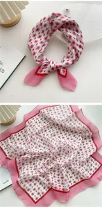 Detailed view of floral cotton linen square scarf with pink flowers and red border