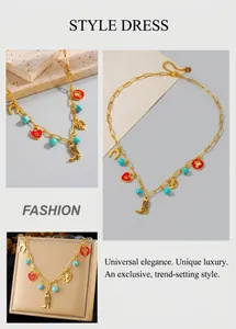 Detail of vintage gold chain necklace with heart charms and matching gift box