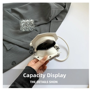 Detailed interior view of a white PU leather hexagonal bag showing phone storage space