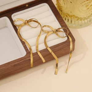 Elegant gold bow earrings with long fringe chains in stainless steel for women