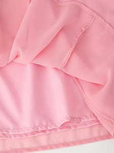 Close-up of pink bohemian chiffon top showing tiered layers and high-quality inner lining