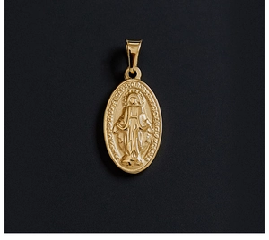 Macro detail of 18K gold-plated oval pendant featuring a religious relief of Virgin Mary