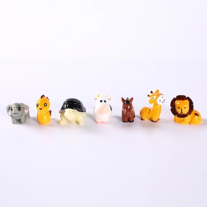 Set of 7 miniature resin animal figurines including lion and elephant for garden decor