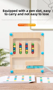 Detail of wooden magnetic marble maze toy with colorful logic cards for kids