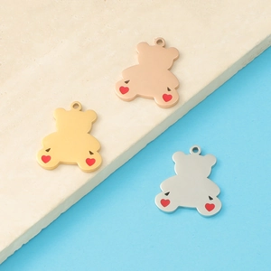 Polished bear charms in gold, silver, and rose gold with red hearts for jewelry making