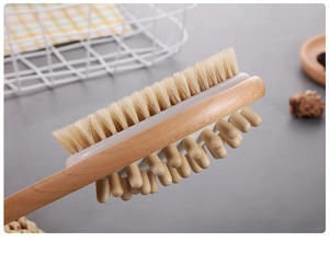Close-up of double-sided bath brush showing soft bristles and round wooden massage nodes