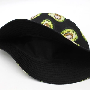 Detail view of the black bucket hat featuring avocado prints and fine cotton stitching