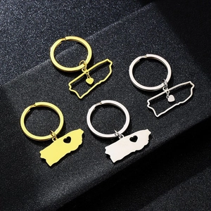 Detailed view of Pennsylvania map keychains in gold and silver finishes with heart cutouts