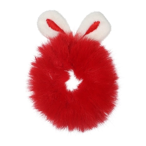 Detail shot of red plush faux fur scrunchie featuring cute white rabbit ear accents