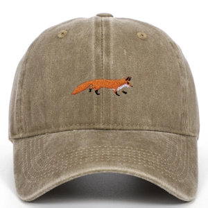 Close-up of red fox embroidery on khaki washed cotton vintage baseball cap