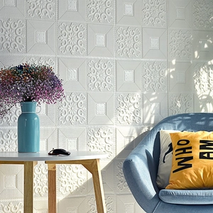 White 3D self-adhesive foam wall stickers with embossed pattern in modern living room décor