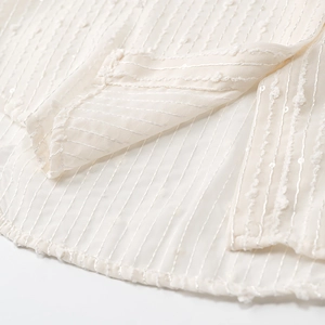 Elegant white jacquard blouse with vertical stripes and delicate texture for women