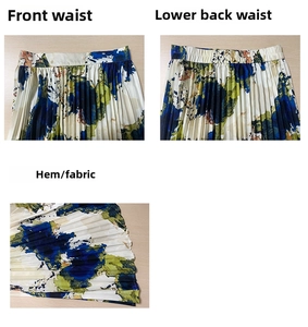 Detail view showing front flat waist, elastic back, and pleated oil painting pattern fabric