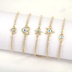 Five gold-plated Evil Eye bracelets with heart and star charms set with cubic zirconia