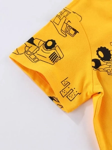 Bright yellow boys cotton T-shirt featuring black cartoon excavator pattern print details