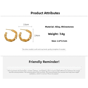 Detail view of gold C-shaped earrings with rhinestones showing dimensions 2.4cm x 2.1cm
