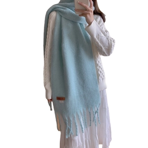 Soft light blue cashmere-feel winter scarf with fringes and Macaron leather label
