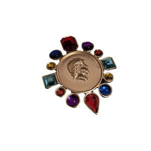 Vintage palace style round brooch with portrait relief and colorful gemstones