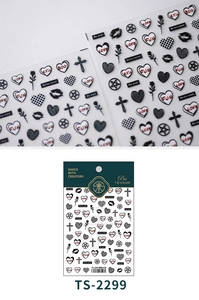 Macro detail of 3D embossed punk nail stickers featuring black hearts and star motifs