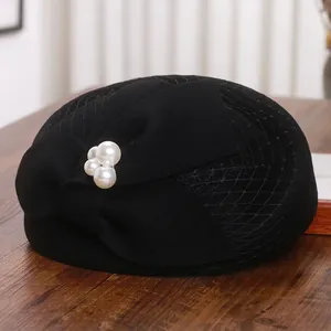 Elegant French wool beret with black mesh veil, large bow accent and white pearls