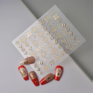 Detail of 5D gold embossed nail stickers with traditional Chinese crane and floral patterns