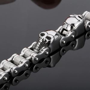 Men's punk stainless steel skull bracelet with biker chain design on reflective background