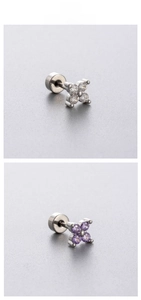 Close-up of zircon flower earrings with white and purple stones and screw back closure