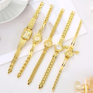 Women Fashion Gold Alloy Quartz Watch Elegant Bracelet Wristwatch With Heart Pendant Hollow Carved Ladies Fashion Jewelry