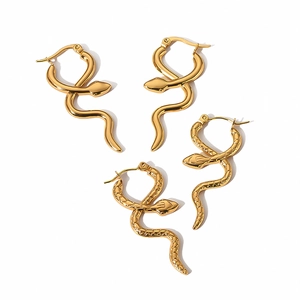 Two pairs of gold snake hoop earrings featuring smooth and textured scale finishes