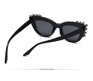 Back view of black cat eye sunglasses with rhinestones and dark grey lenses