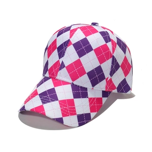 Pink and purple argyle patterned baseball cap with a white geometric lattice design