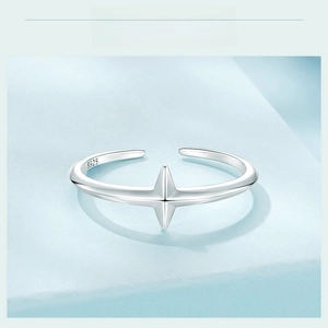 Close-up of S925 sterling silver stamp and 3D star motif on adjustable open ring