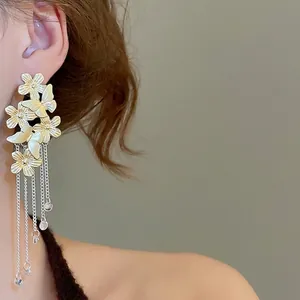 Exquisite flower and butterfly tassel earrings with crystals in vintage matte gold