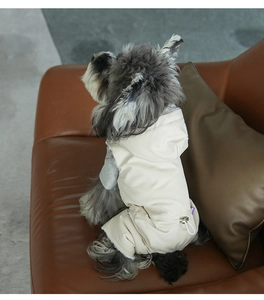 Detail view of a padded dog hoodie featuring adjustable drawstring and soft plush lining