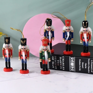 Set of 6 wooden Nutcracker soldier ornaments with gold hanging strings for Christmas trees