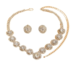 Golden bridal jewelry set with floral necklace and sparkling round rhinestone earrings