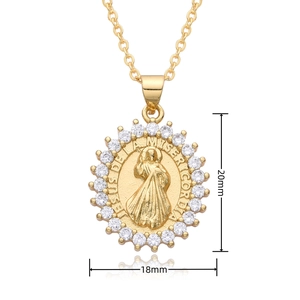 Close-up of 18k gold Jesus of Mercy pendant with white zircons and 20mm height dimensions